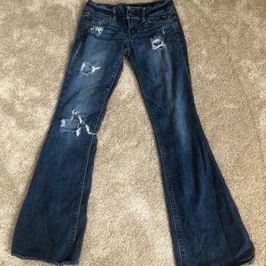 Wide bottom ripped denim jeans